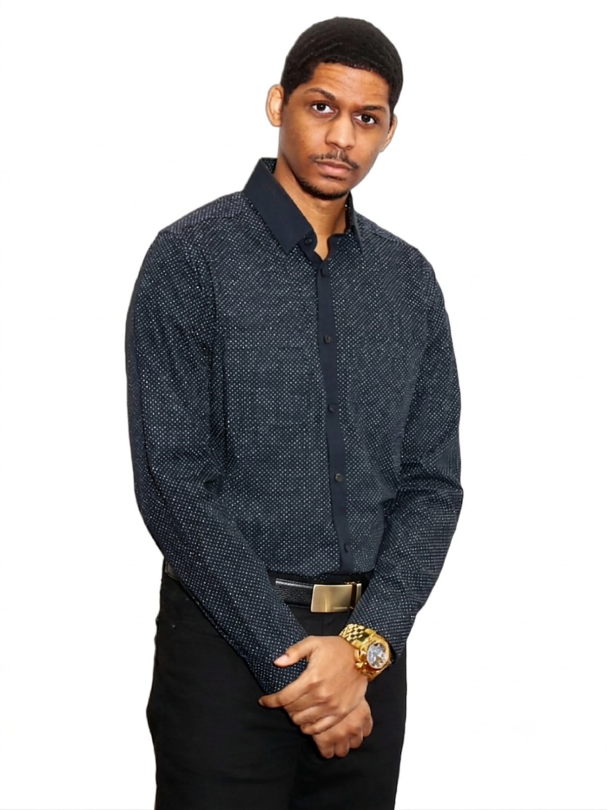 Carleton King in a navy dress shirt