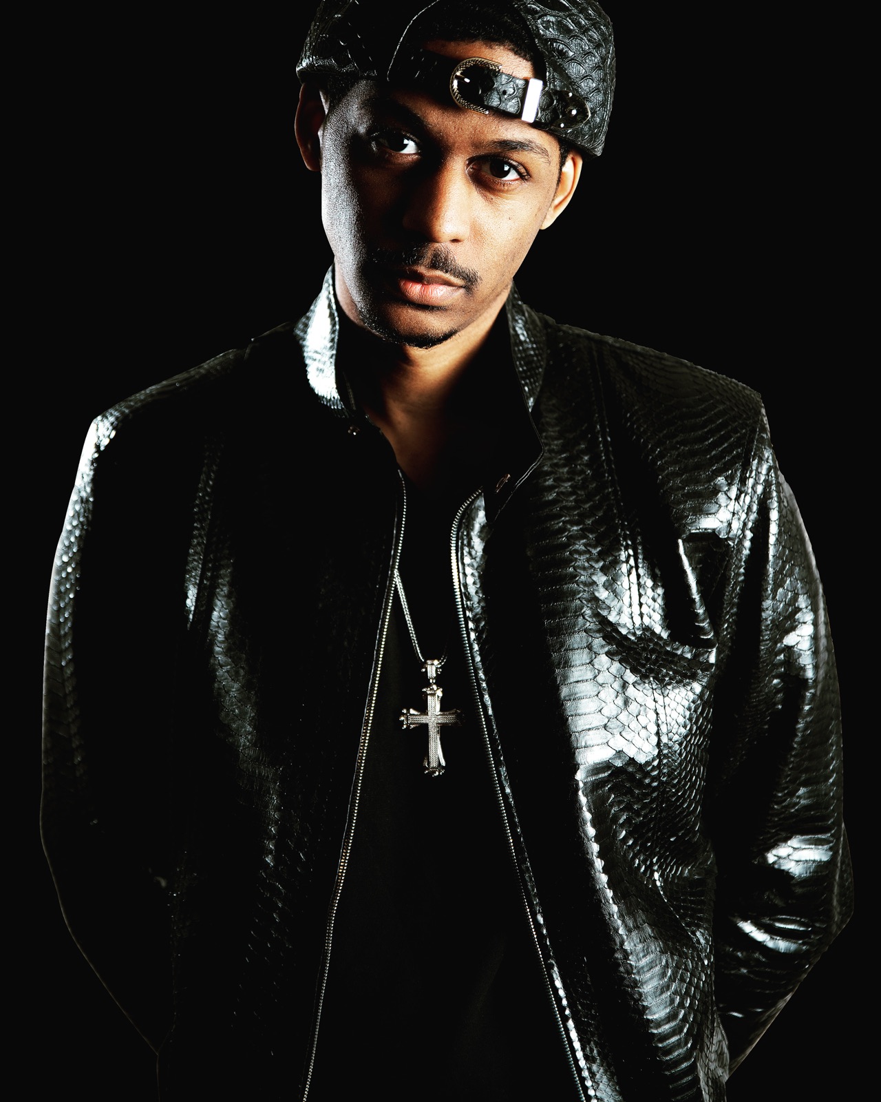 Carleton King in a black snakeskin jacket